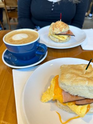 Egg and cheese biscuits with ham. Rosemary biscuit with ham. Lavender honey latte.