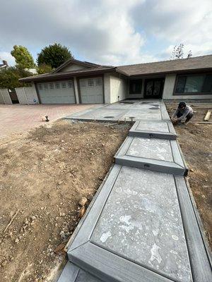 Concrete steps with stamp and lights coming in Yorba linda