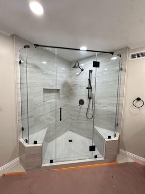 Custom Frameless shower door 
3/8 clear tempered glass w/ matt black