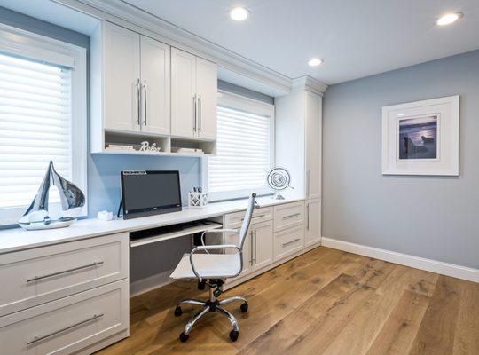 Custom white shaker cabinets in home office