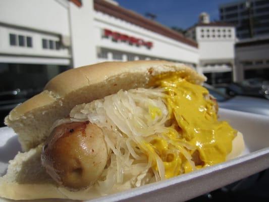 Germany's Famous Bratwurst Truck's weisswurst mit sauerkraut.