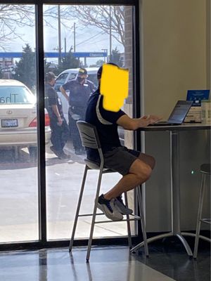 Old people complain about young on their phones at work, but here we have an older man leaning on my truck talking to his friend.