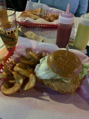 Pork tenderloin sandwich and side winder fries.