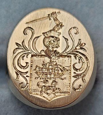 Hand engraved coat of arms