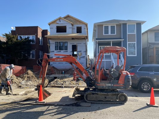 Putting in the main sewer and water line