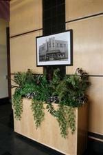 Lobby of 60657 Lofts; the art hanging is a photo of the site pre-development