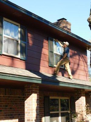 Inspecting roof and windows