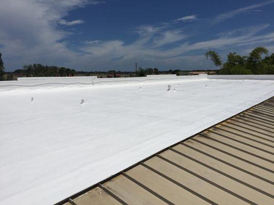 High solids silicone over a modified roof.