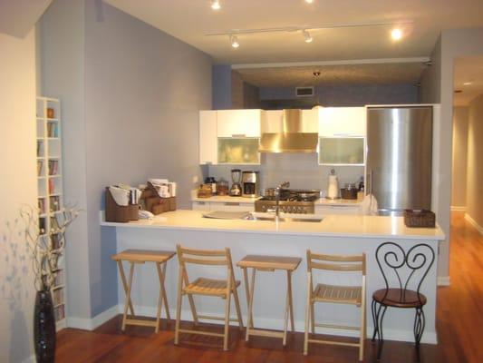 Blue accent wall updates an open kitchen