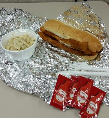 The fish sandwich was tasty. Haluski, not so much.  Frank's Red Hot packets!