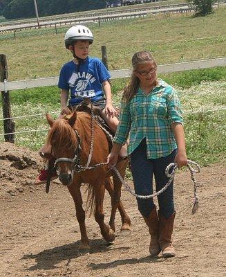 Our Summer Cay Campers go on a variety of field trips, like this one to Marmon Valley Farm.