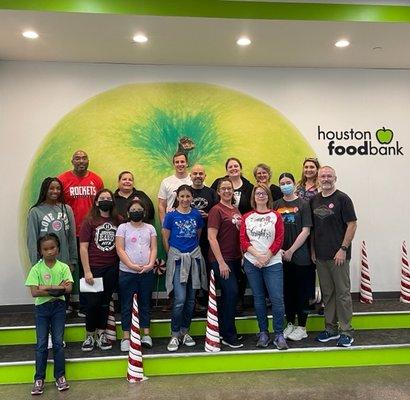 A few associates and their families had the chance to volunteer at the Houston Food Bank.