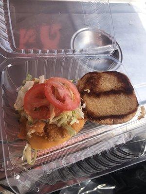 Original Fry Daddy's Fish Burger with cheese , lettuce and tomatoes with are special sauce.