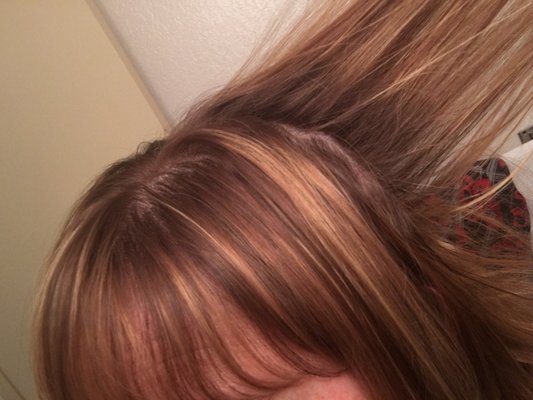 Not bayalage or ombré. Looks like stripey two month old highlights.