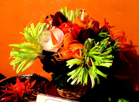 Vegetable floral arrangement in salt dough basket.