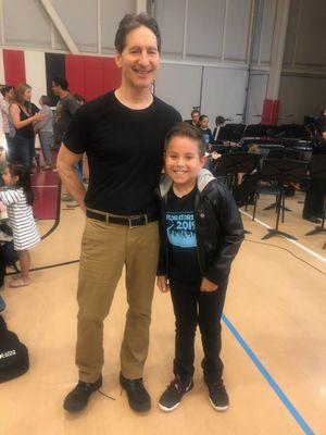 Oliver after his performance with Mike his teacher