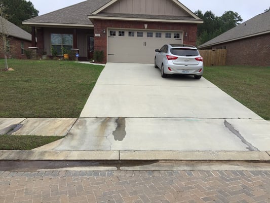 Water coming up through big cracks in my driveway, even though it hasn't rained in eight days