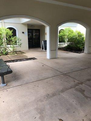 Entrance through the portico to surgery center