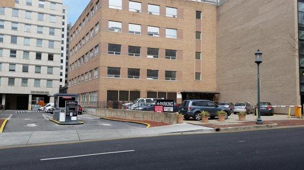 View of our building (red brick one).The street is Montgomery Ave. Wisconsin Ave is to the left. The county parking garage is on the right.