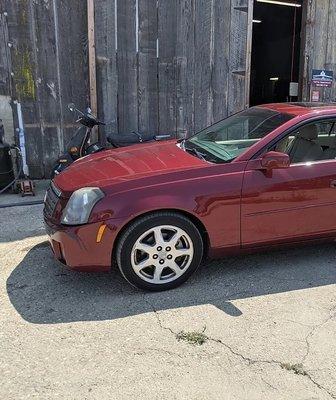 Car for sale in front of our repair shop.