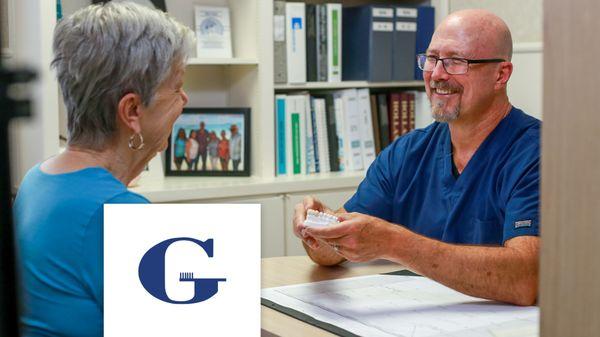 Dr. Gray speaking with patient about options