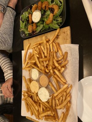 Appetizer fries and bang bang shrimp, the fries have a sauce menu where you can try different flavors!