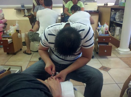 Getting myy toes n nails done for d party....