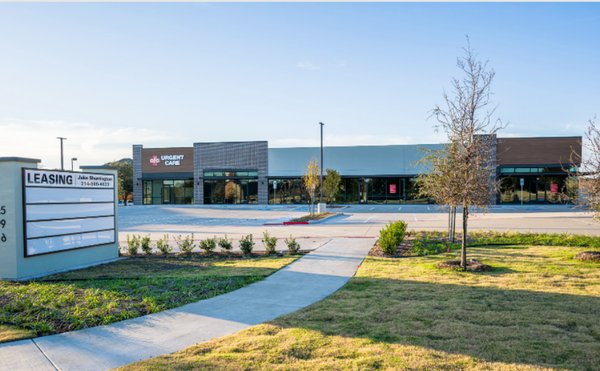 Exterior photo of AFC Urgent Care Allen and it's parking lot.