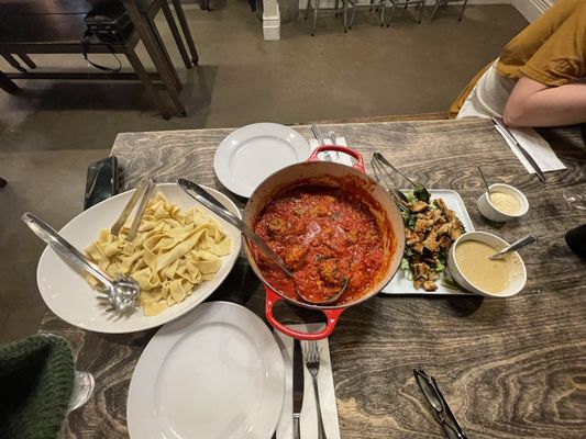 Sunday pasta dinner Homemade pasta, meatballs in red sauce, grilled Caesar salad with home made dressing.