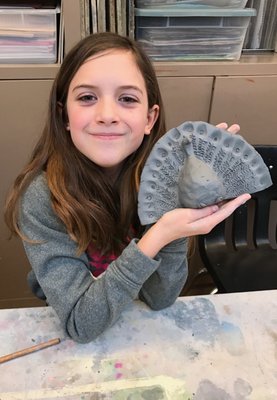 Working on a project in clay!