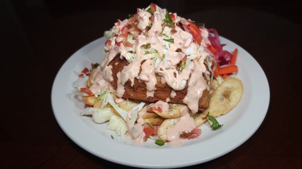 poll con tajadas

fried chicken with green bananas and special sauce