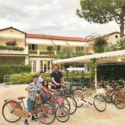 Largay Travel clients taking a break from a family bike ride on their 2 week trip to Italy.