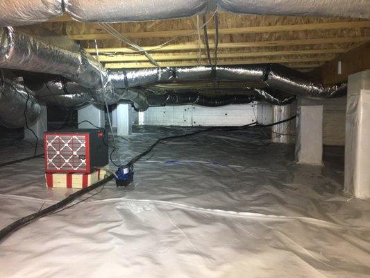 Encapsulated Crawl Space with CleanSpace, Foam Board, and Sanidry Sedona Dehumidifier.