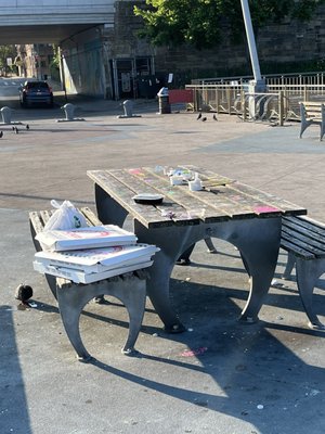 Garbage all over the place. Need more garbage cans on the pier attached to the fence. There are five garbage cans on the whole pier.