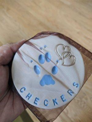 Checkers Paw Print.