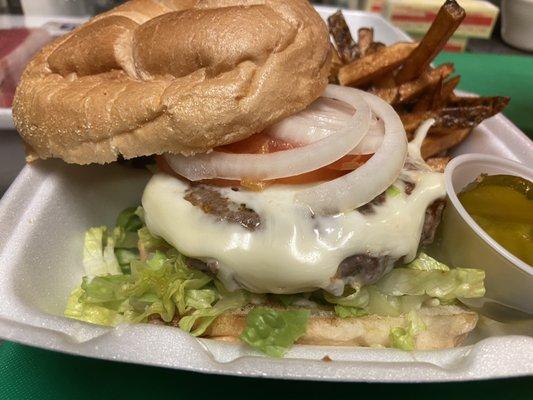 Half pound in house made Burger with house fries!