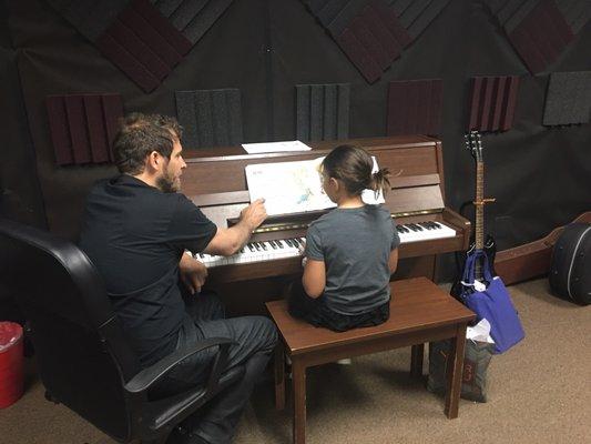 Steve teaching my daughter a new song.