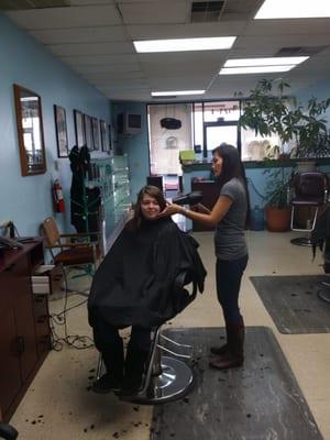 My daughter getting a trim!