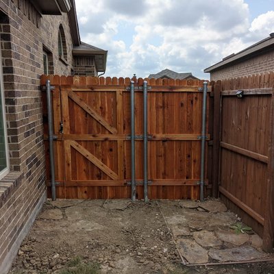 New gate and small section of fence in Haslet, TX.

Girard Contracting and Construction