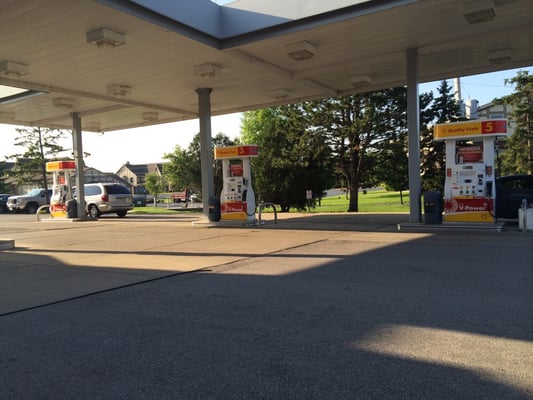 6 Shell gas pumps.