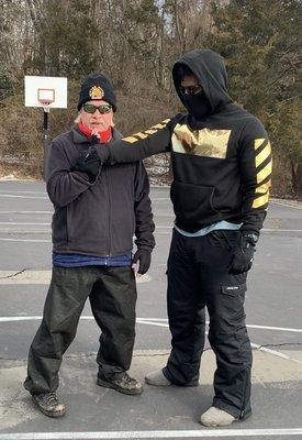 Prep for a Chin Na technique ( Joint Lock). This is at an outdoor class in McLean,VA.