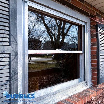 A window after being cleaned by Bubbles.