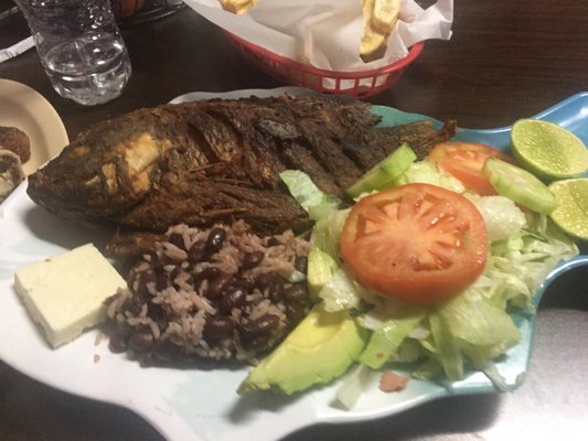 Fish, beans & rice, cheese, lime, and salad