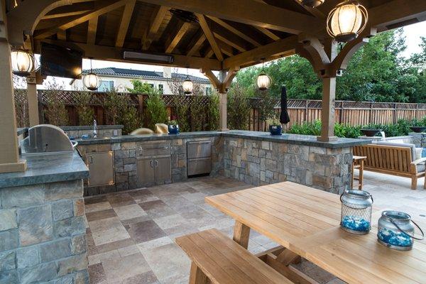 Outdoor kitchen with custom pergola