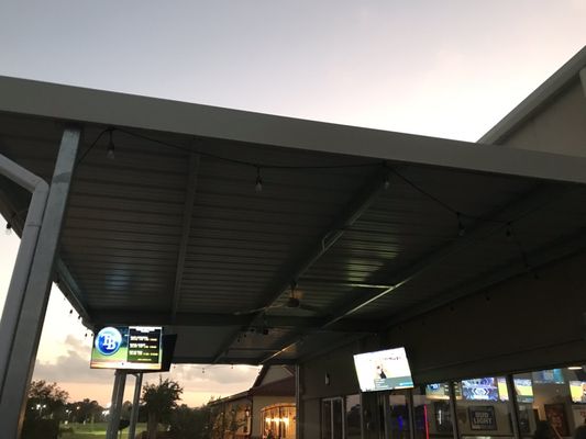 Covered patio with TVs