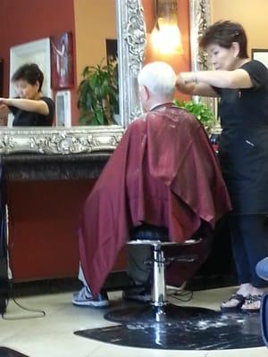 My cute grandpa getting a haircut. The owner is super sweet.