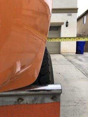 Passenger side rear bottom measurement from frame to outside of fender