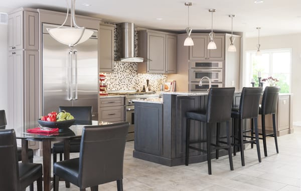 Beautiful semi-custom cabinets, hardware and elegantly durable quartz make this client very happy every day with her new living space!