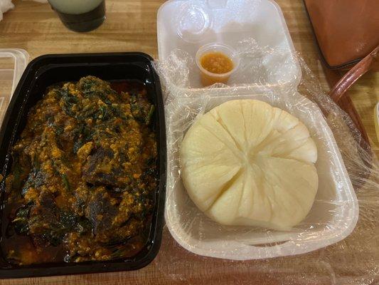 Engusi and fufu with beef and chicken for meat