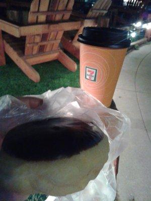 A late night coffee and donut on the run.